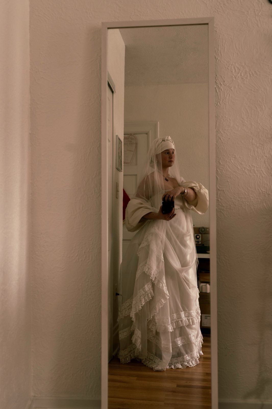 Hannah in custom redesigned wedding gown by Tailor & Lace vintage wedding dress specialist Pittsburgh